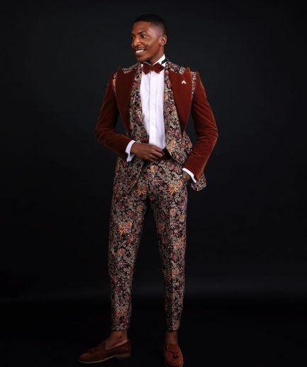 A “Dent” Floral Syrup Brown Metallic Jacquard Peak Quad Lapel Suit, Bow Tie & Gurkha Pant Trousers.