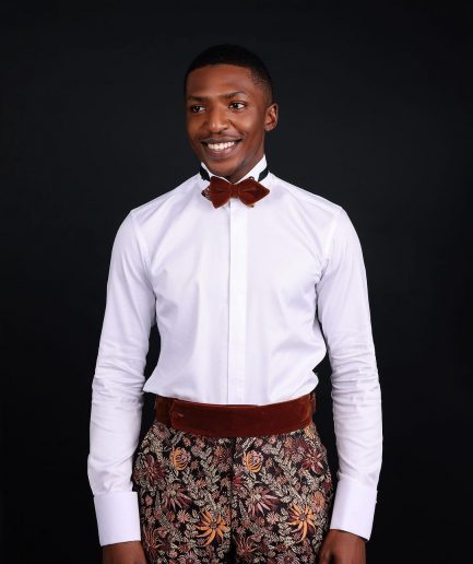 A White Invisible Stripe, Double Cuff, Wing Collar Shirt With High Waist Gurkha Pant Trouser.