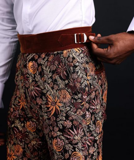 A pencil-cut, brown-mix metallic floral jacquard side strap with metal adjuster pant