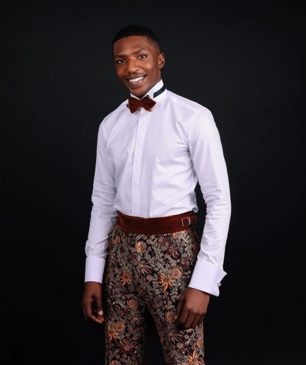 A White Invisible Stripe, Double Cuff, Wing Collar Shirt With High Waist Gurkha Pant Trouser.