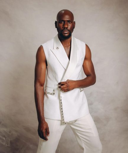 An Ivory White Monochrome “Jilted” Trio Lapel Armless Jacket With Swarovski Crystal Stone Details