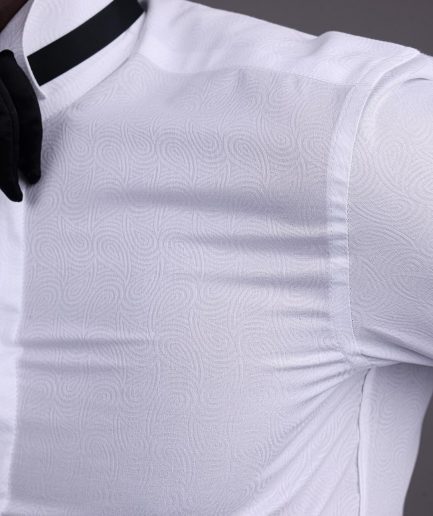 A White, covered button, connected paisley print wing collar tuxedo shirt.