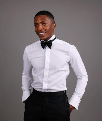 A White, covered button, connected paisley print wing collar tuxedo shirt.