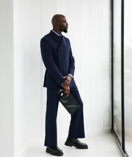 A Navy Blue, Seersucker, “Herd” Warp Peak Lapel Suit.