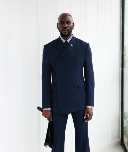 A Navy Blue, Seersucker, “Herd” Warp Peak Lapel Suit.