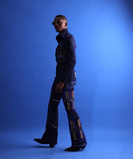 A Navy Blue “Anikulapo” High Waist, Trumpet Cut With Arewa Embroidery Details Pants With Side Metal Adjuster