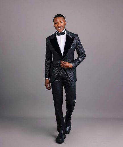 A Charcoal Black, Stuffed Or Slanted Square-Patterned Jacquard Peak lapel Tuxedo Suit