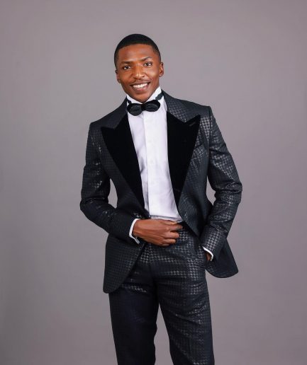 A Charcoal Black, Stuffed Or Slanted Square-Patterned Jacquard Peak lapel Tuxedo Suit
