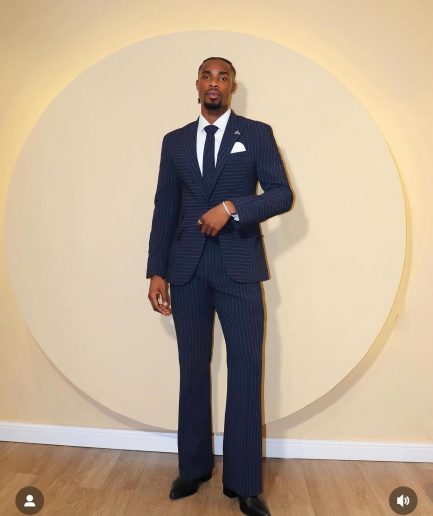 A Navy Blue, Seersucker, Reversed Pin Stripe Peak Lapel Suit