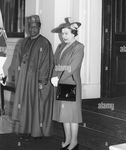 A Navy blue, “IBB”, arewa front cut, traditional detailing embroidery details tagbada