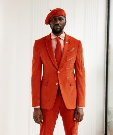 A Vermillion Orange Corduroy Notch Lapel With Gold Zipping Details Suit