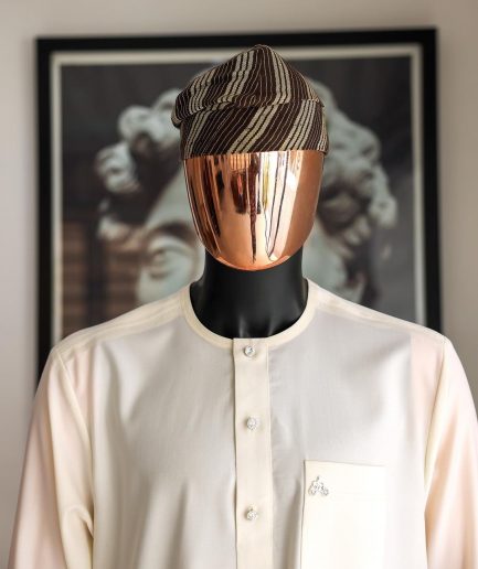 An Ivory white front flap with silver Swarovski button details, long-sleeve African senator kaftan native