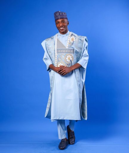 A sky blue galactical embroidery with gold and blue print jacquard details agbada