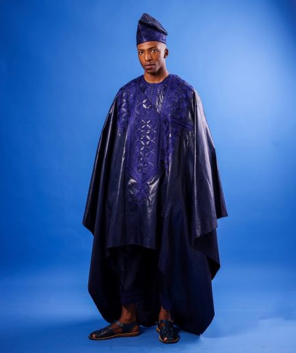 A Navy blue "Arewa" embroidery front cut towards back, traditional Agbada, 3/4 sleeve kaftan, and Sokoto