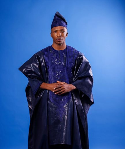 A Navy blue "Arewa" embroidery front cut towards back, traditional Agbada, 3/4 sleeve kaftan, and Sokoto