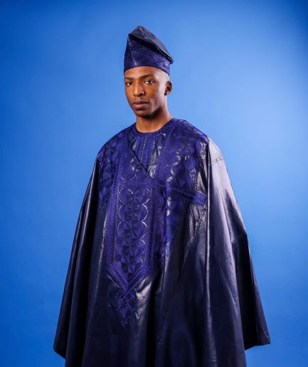 A Navy blue "Arewa" embroidery front cut towards back, traditional Agbada, 3/4 sleeve kaftan, and Sokoto