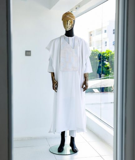 A White, dropping maze line embroidery details agbada, 3/4 sleeve kaftan, and Sokoto