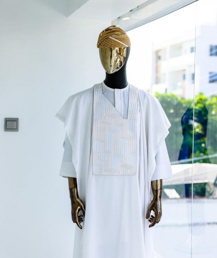 A White, dropping maze line embroidery details agbada, 3/4 sleeve kaftan, and Sokoto