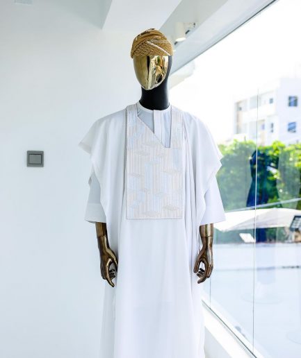 A White, dropping maze line embroidery details agbada, 3/4 sleeve kaftan, and Sokoto