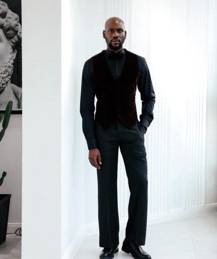 A Charcoal Black High Waist, Trumpet-Cut Details Pant With A Side Metal Adjuster.