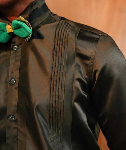 A Silk, dark seaweed green, pleated tuxedo shirt.