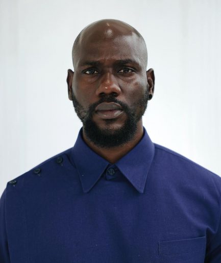A Navy blue, layered front-covered shirt.