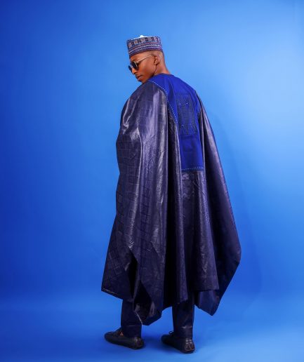 A Navy blue, Malian with layered dropped square pattern jacquard embroidery details, traditional Agbada