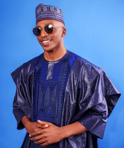 A Navy blue, Malian with layered dropped square pattern jacquard embroidery details, traditional Agbada