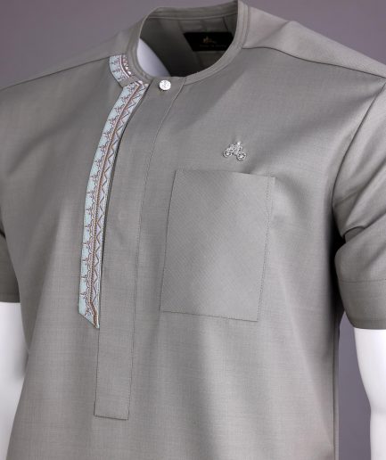 A Light grey, front flap with silver studded Swarovski buttons, left drop Arewa embroidery, short sleeve African senator kaftan native