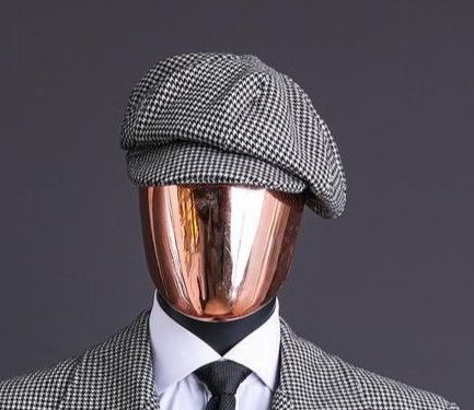 A Light Grey And Black Mix Of Houndstooth Check Hat.