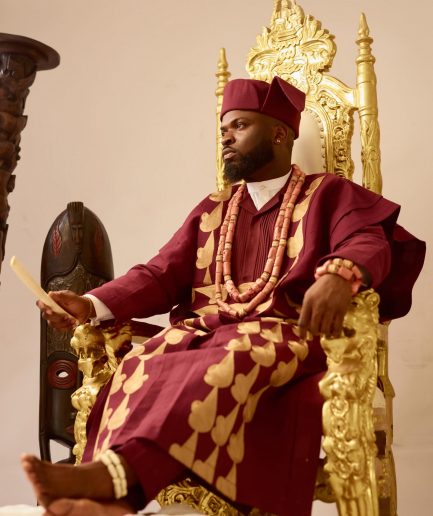 A Burgundy, deltagbada flapper embroidery details agbada