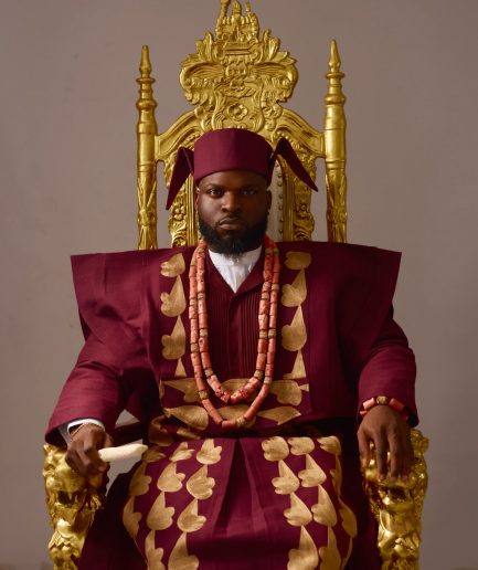 A Burgundy, deltagbada flapper embroidery details agbada