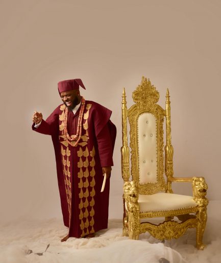 A Burgundy, deltagbada flapper embroidery details agbada