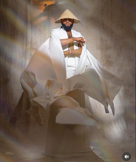 A monochrome ivory white deconstructed jacket with flare