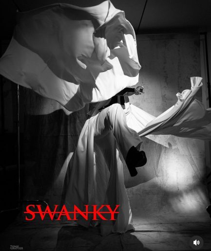 A monochrome ivory white deconstructed jacket with flare