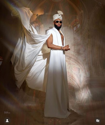 A monochrome ivory white deconstructed jacket with flare