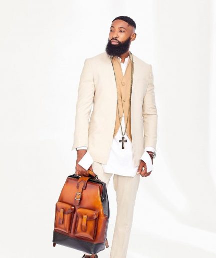 A white Cut Hand Linen Kaftan and Light Brown