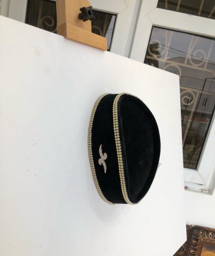 A Black and Gold Ceremonial African Traditional Hat