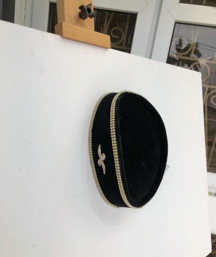 A Black and Gold Ceremonial African Traditional Hat