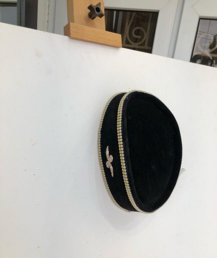 A Black and Gold Ceremonial African Traditional Hat
