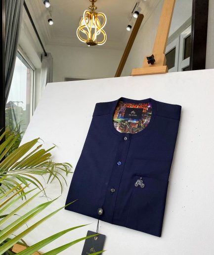 A Navy Blue With mixed Swarovski buttons detailing African Kaftan and sokoto