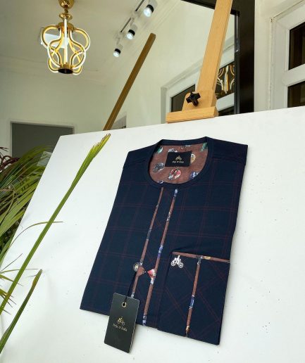 A Navy blue and Onion Check front flap with paisley detailing kaftan.