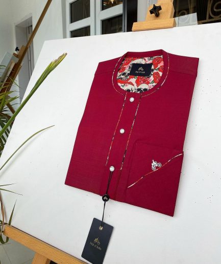 A Burgundy African Kaftan with silver Swarovski buttons, paisley detailing and sokoto
