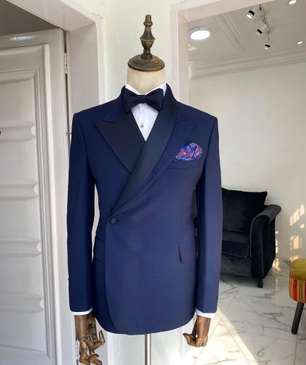 A Navy blue Reloaded “Arthur Richard” wrap peak and shawl lapel Tuxedo Suit