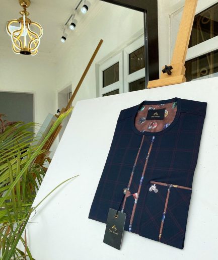 A Navy blue and Onion Check front flap with paisley detailing kaftan.
