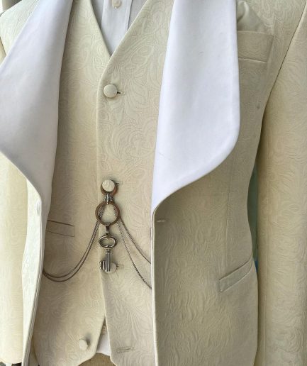 An Ivory White “Celestial” shawl lapel tuxedo tailored suit
