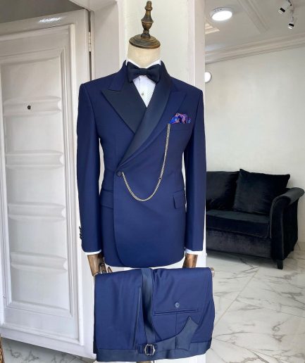A Navy blue Reloaded “Arthur Richard” wrap peak and shawl lapel Tuxedo Suit