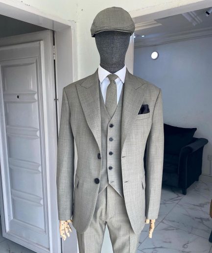An Irish grey Bespoke reloaded “peaky blinders” Peak lapel suit