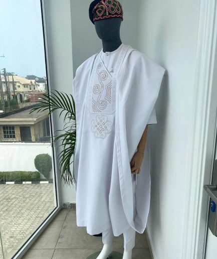 A Cocaine white with a floral Japanese intersection design with Swarovski stone detailing  Agbada