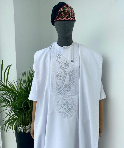 A Cocaine white with a floral Japanese intersection design with Swarovski stone detailing  Agbada